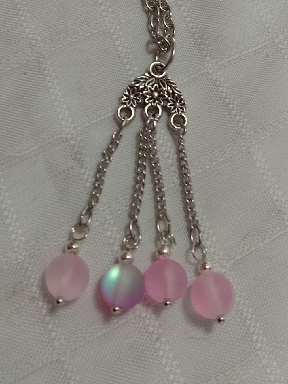 Exquisite handmade necklace featuring a half-moon-shaped Tibetan silver charm